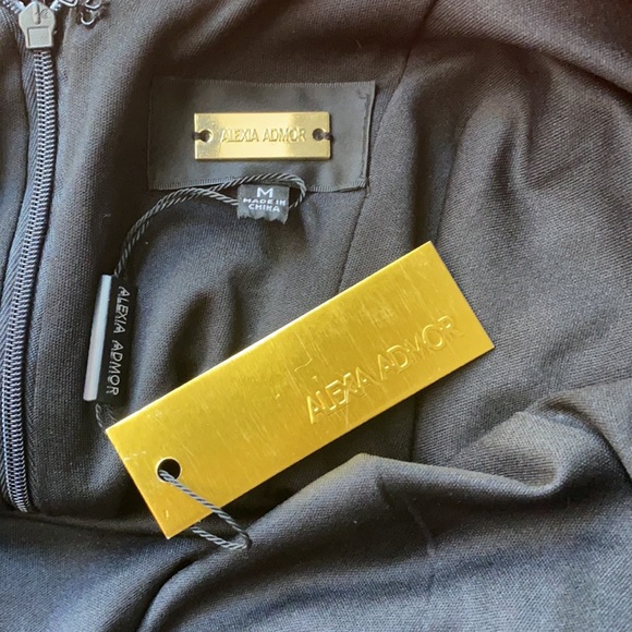 New with tags party dress. This dress is stunning and never been worn. - Picture 7 of 9